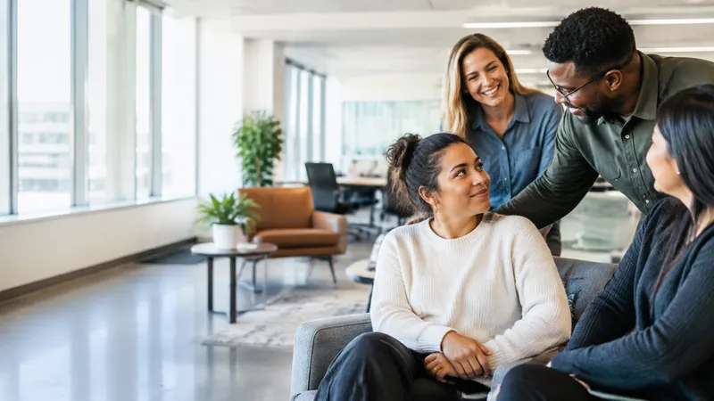 Diverse employees sharing a workplace wellbeing moment