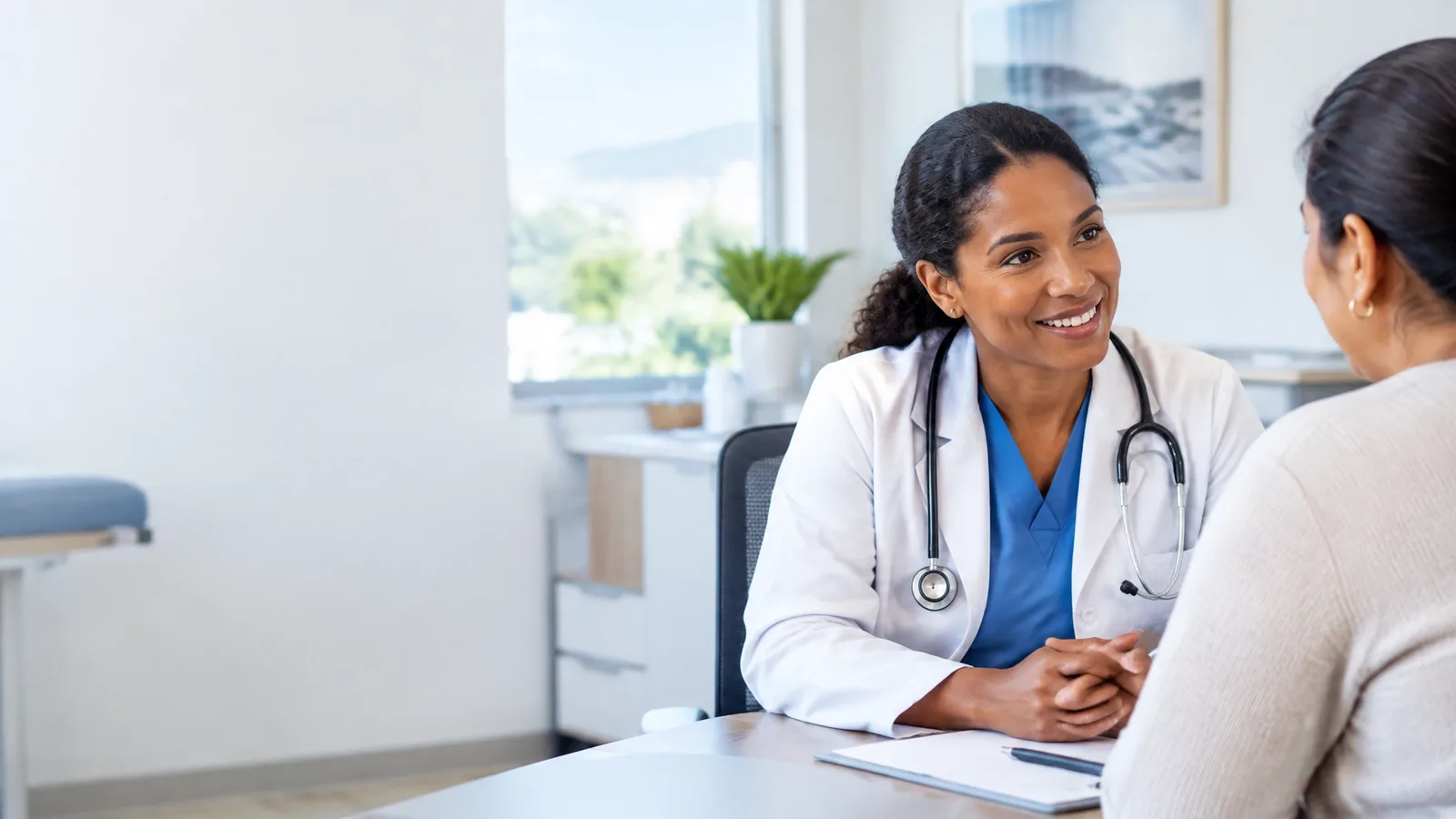 Doctor speaking with a patient in a welcoming local clinic